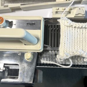 sk-120 knitting machine with a sample